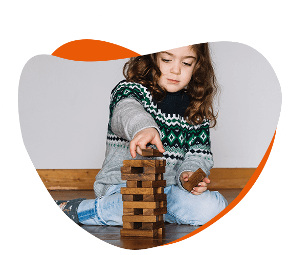 Learning through Play: Child Engaged in Jenga Puzzle during Online Class-Cyboard School