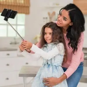 A child is recording a vlog on mother's day-Mother’s Day activities for kids