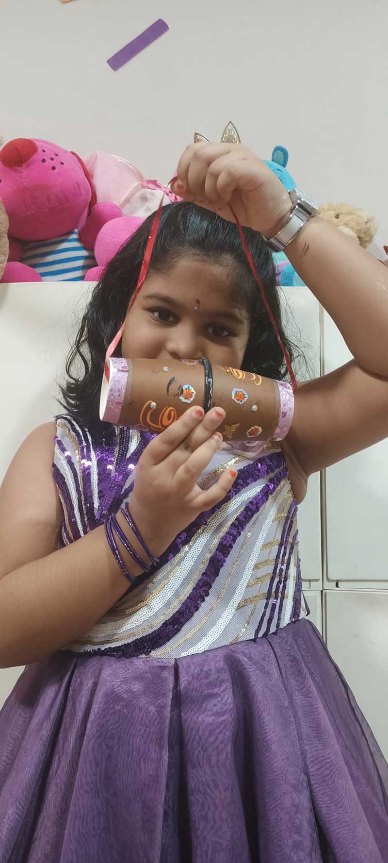 Cyboard Student is preparing a cardboard drum for a activity