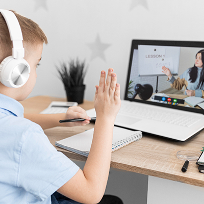 A student on a video call with their teacher, engaging in a discussion