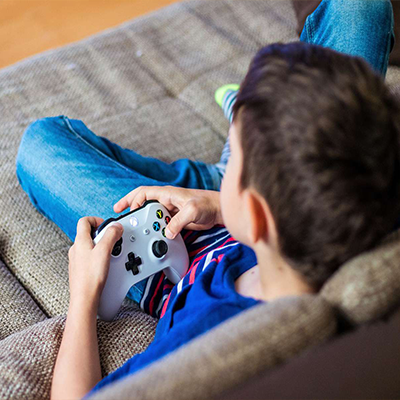 Kid playing video game