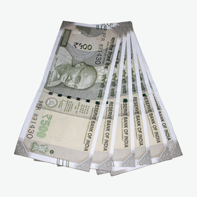 a bundle of notes with gold coins