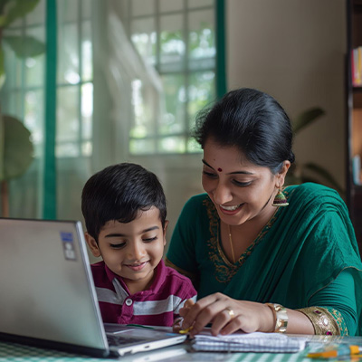 Parent Reviewing A Nep 2020-Aligned Curriculum While A Child Learns Coding And Digital Skills.