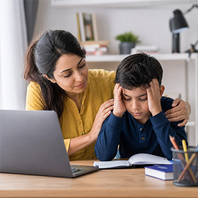 Parent supporting child during stressful school days